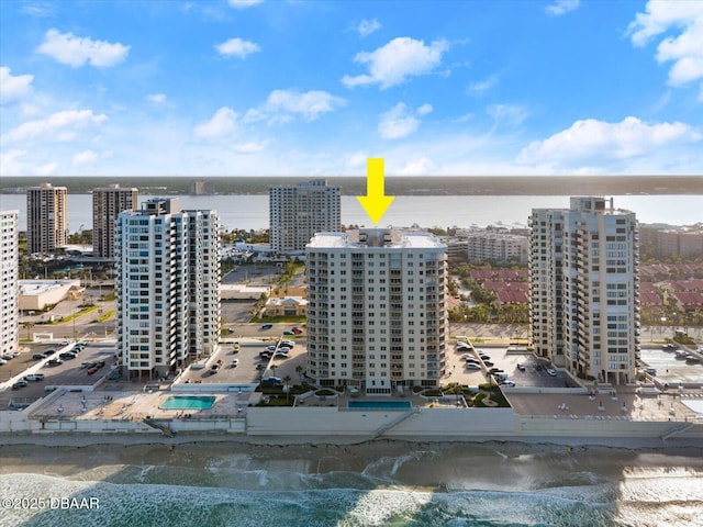 bird's eye view with a city view and a water view
