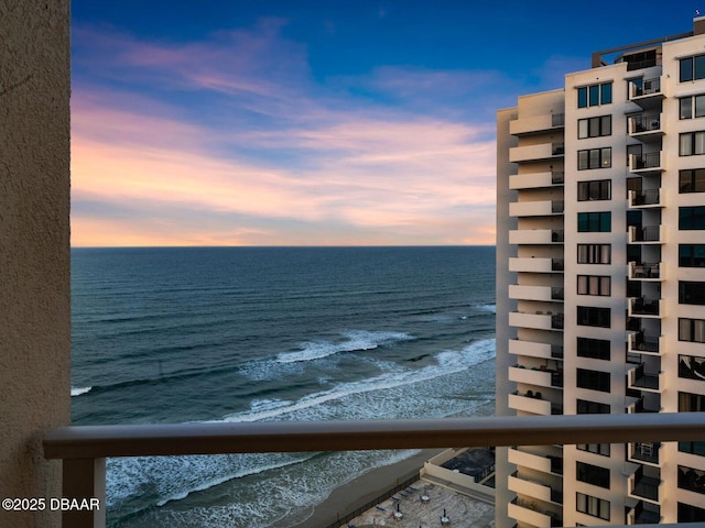 property view of water featuring a beach view