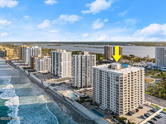 aerial view featuring a water view and a view of city