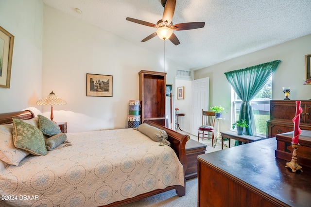 129 Rae Dr, Palm Coast, FL 32164 - carpeted bedroom featuring access to outside, lofted ceiling, a ceiling fan, and a textured ceiling