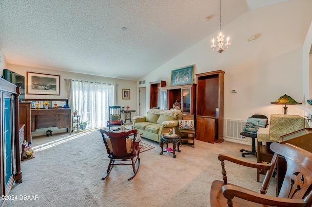 carpeted living room with a textured ceiling, high vaulted ceiling, and an inviting chandelier