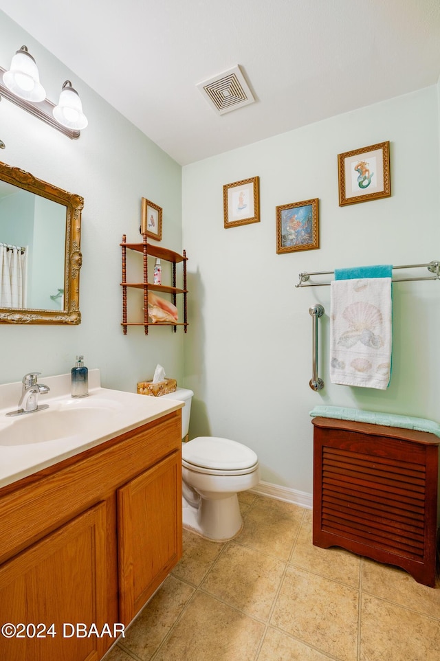 129 Rae Dr, Palm Coast, FL 32164 - bathroom featuring vanity and tile patterned floors