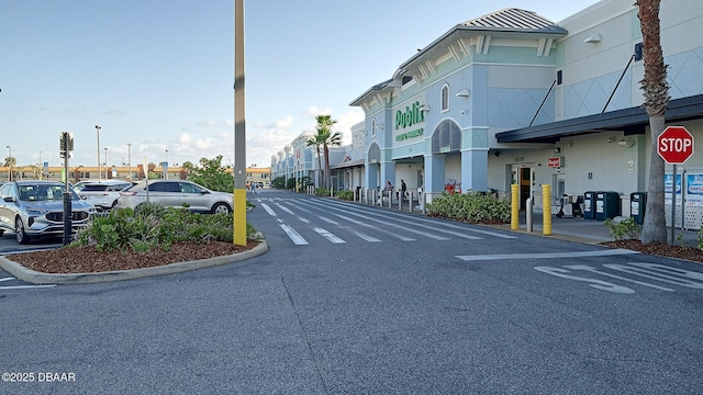 59 Margaret Rd, Ormond Beach, FL 32176 - view of road with traffic signs and curbs