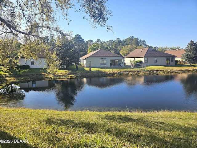 view of water feature featuring fence