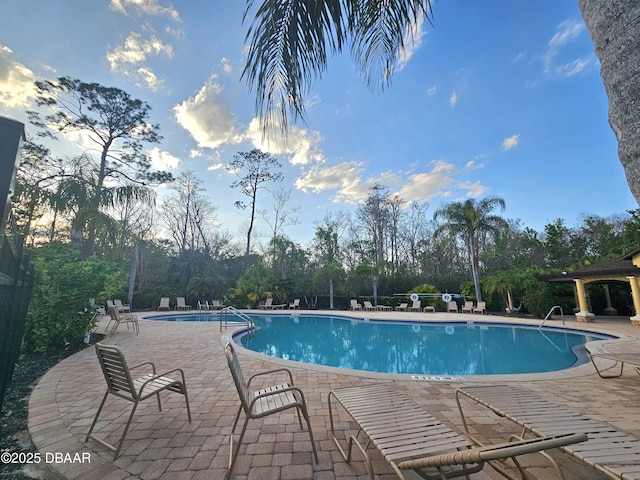 community pool featuring a patio