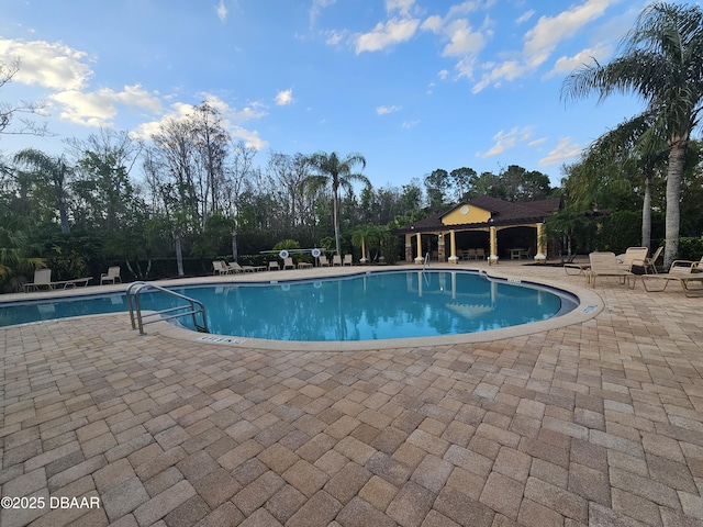 pool with a patio