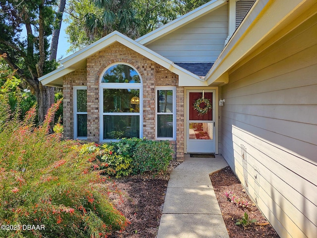 900 Smokerise Blvd, Port Orange, FL 32127 - view of exterior entry with roof with shingles