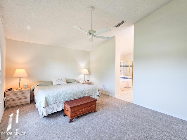 900 Smokerise Blvd, Port Orange, FL 32127 - bedroom featuring carpet flooring, vaulted ceiling, a textured ceiling, connected bathroom, and baseboards