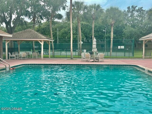 900 Smokerise Blvd, Port Orange, FL 32127 - community pool featuring a gazebo and a patio
