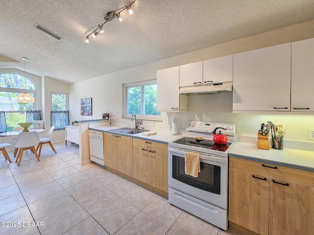 900 Smokerise Blvd, Port Orange, FL 32127 - kitchen featuring white appliances, under cabinet range hood, a sink, a textured ceiling, and light tile patterned flooring