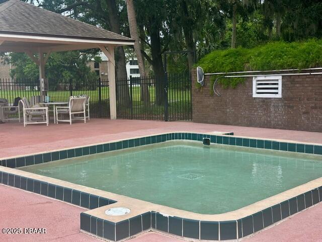 900 Smokerise Blvd, Port Orange, FL 32127 - view of swimming pool with a patio and a gazebo