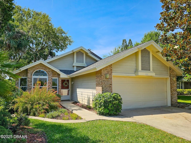 900 Smokerise Blvd, Port Orange, FL 32127 - view of front of property with brick siding, a garage, driveway, and roof with shingles