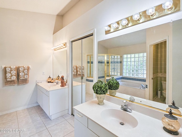 900 Smokerise Blvd, Port Orange, FL 32127 - full bathroom with vanity, a bath, tile patterned flooring, toilet, and a shower stall