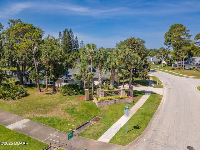 900 Smokerise Blvd, Port Orange, FL 32127 - surrounding community with a lawn and a residential view