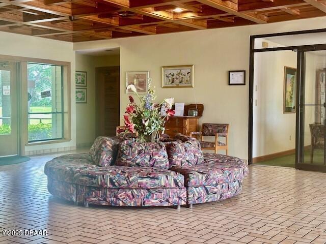 900 Smokerise Blvd, Port Orange, FL 32127 - living room with coffered ceiling, beam ceiling, and brick patterned floors