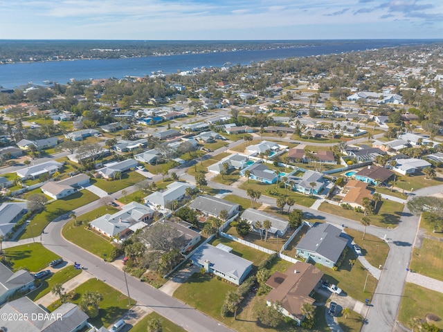 aerial view with a water view and a residential view