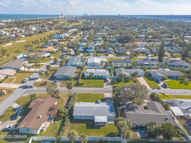 aerial view featuring a water view and a residential view