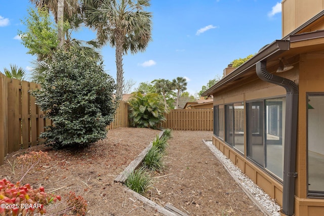 view of yard featuring a fenced backyard
