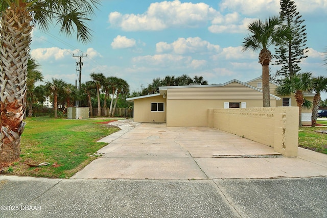 view of front of home with a front yard