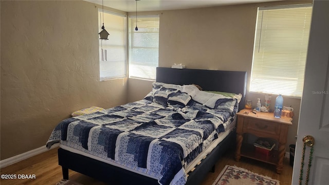 bedroom featuring hardwood / wood-style floors