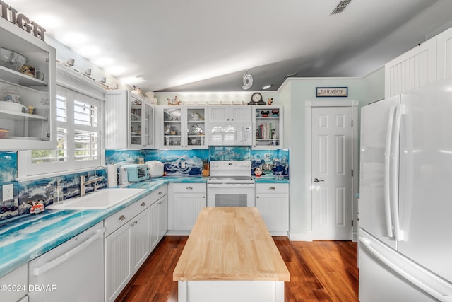 kitchen featuring white cabinetry, white appliances, dark wood-type flooring, and wooden counters