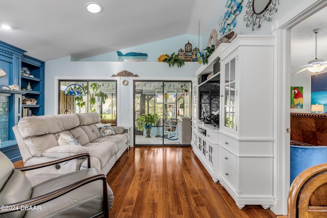 living room featuring ceiling fan, dark hardwood / wood-style flooring, and lofted ceiling