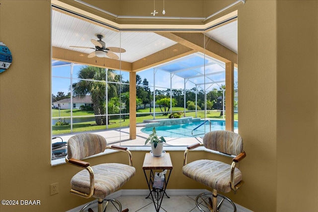 view of pool featuring ceiling fan