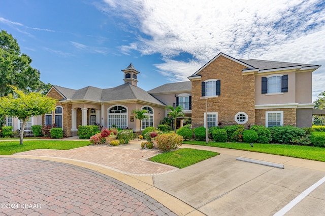 view of front of home with a front lawn