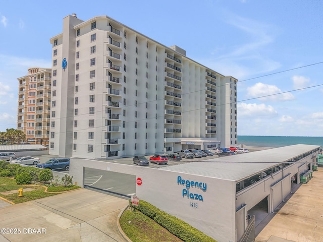 view of building exterior with a water view