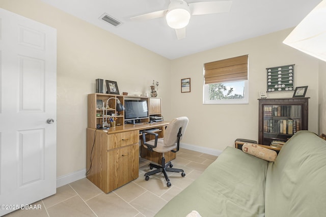 tiled office space with ceiling fan