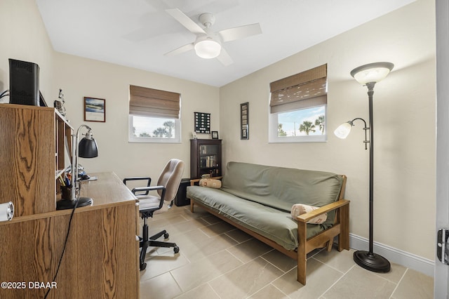 tiled home office with ceiling fan