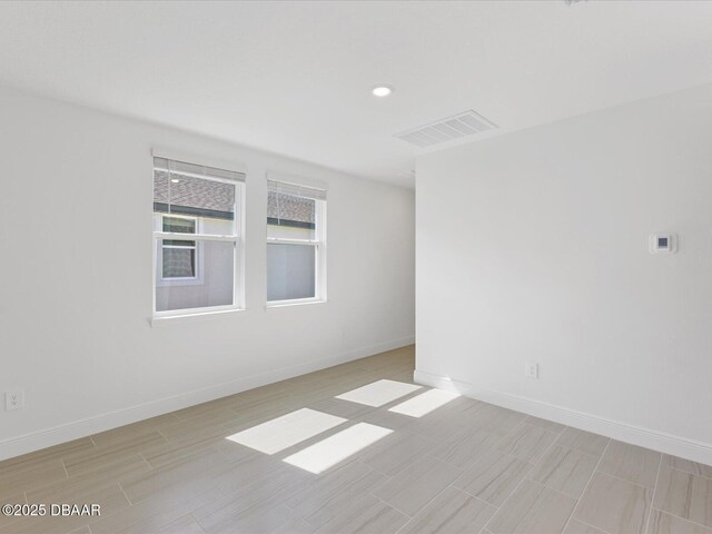 173 Links Terrace Blvd, Daytona Beach, FL 32124 - unfurnished room featuring baseboards, light wood finished floors, and recessed lighting