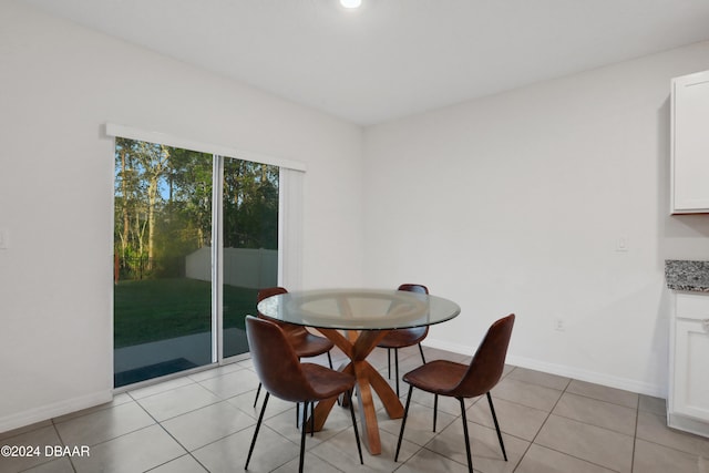 view of tiled dining space