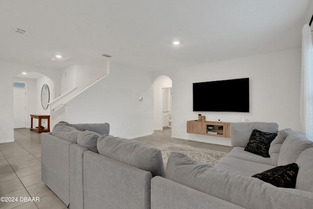 living room featuring light tile patterned floors