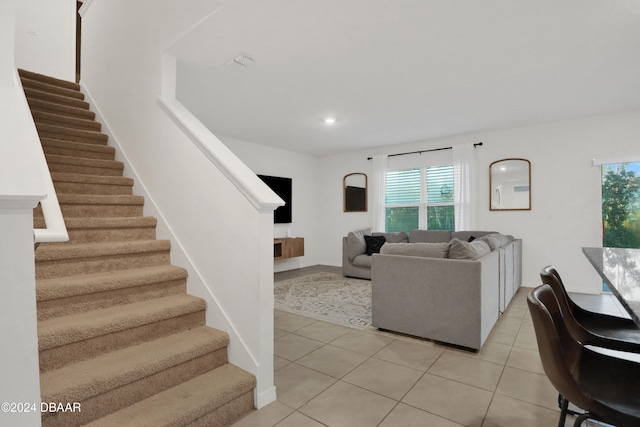 living room featuring light tile patterned flooring