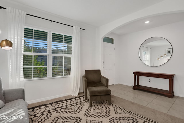 sitting room featuring light tile patterned floors