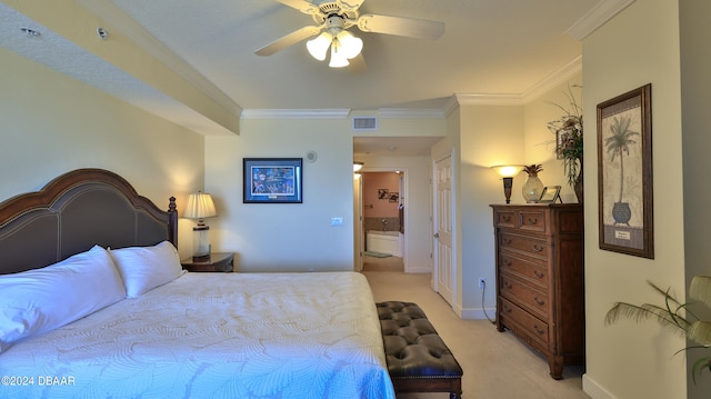 carpeted bedroom featuring ceiling fan and crown molding