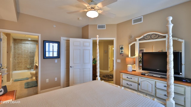 bedroom with ceiling fan, connected bathroom, and light tile patterned floors