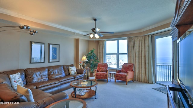 2403 S Atlantic Ave Unit 1210, Daytona Beach Shores, FL 32118 - living room with light colored carpet, crown molding, a ceiling fan, and a textured ceiling