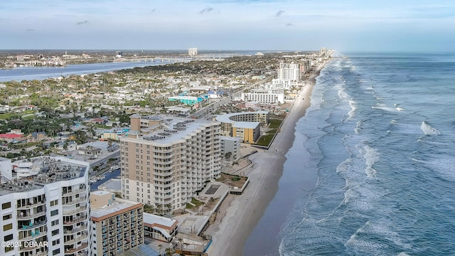 bird's eye view with a view of the beach and a water view