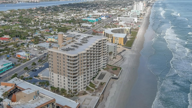 bird's eye view with a beach view and a water view