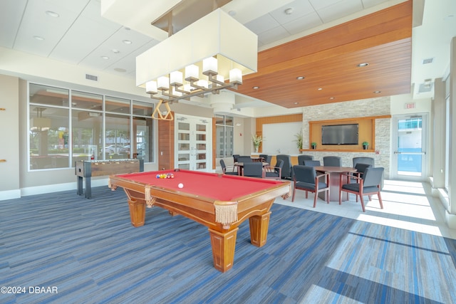 recreation room featuring french doors, billiards, a high ceiling, and carpet