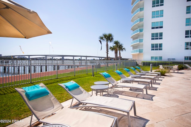 view of patio / terrace with a water view