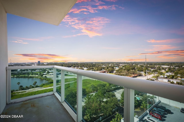 balcony at dusk with a water view