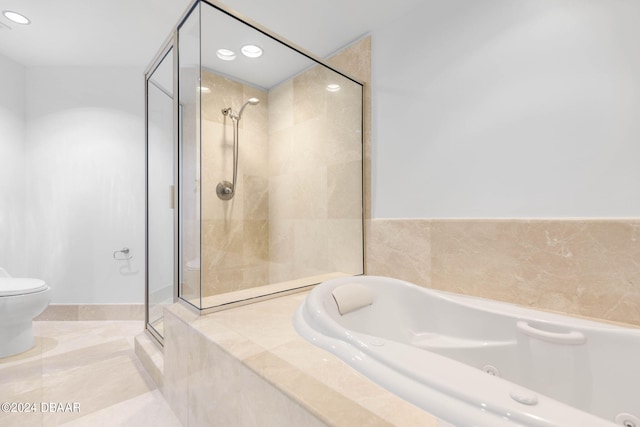 bathroom with independent shower and bath, tile patterned floors, and toilet