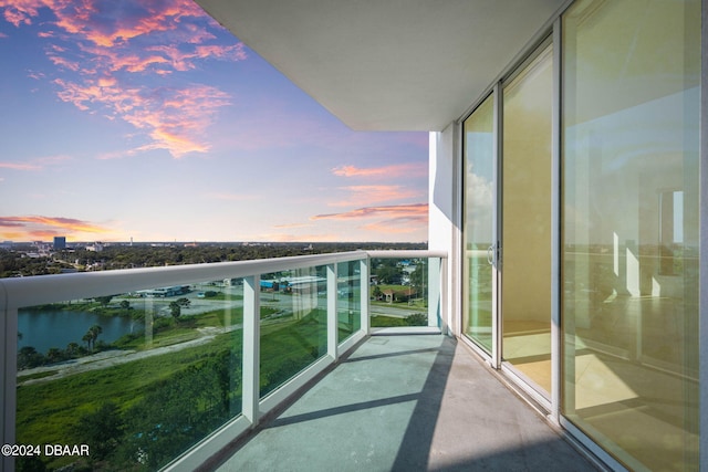 view of balcony at dusk