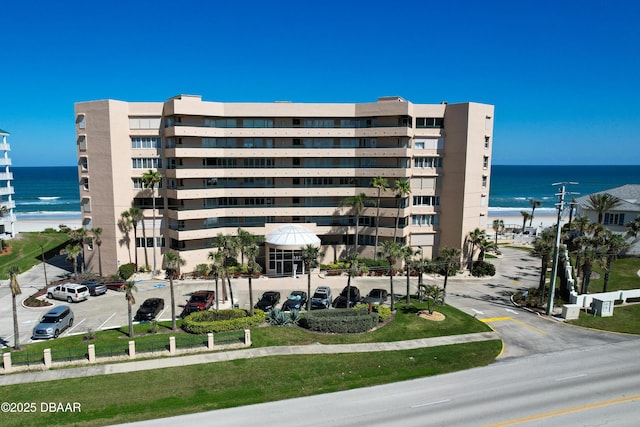 view of building exterior with a water view