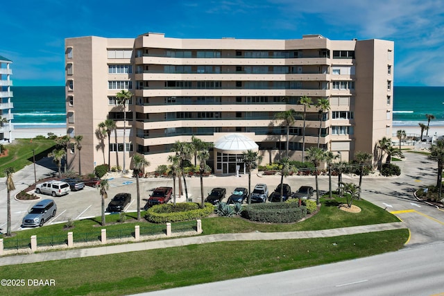 view of building exterior with a water view