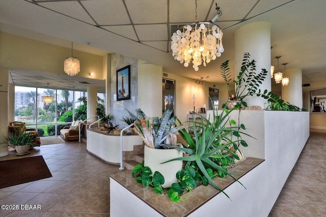 4601 S Atlantic Ave Unit 702, Ponce Inlet, FL 32127 - reception area featuring a chandelier