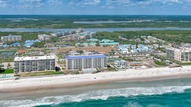 4601 S Atlantic Ave Unit 702, Ponce Inlet, FL 32127 - drone / aerial view with a water view and a view of the beach